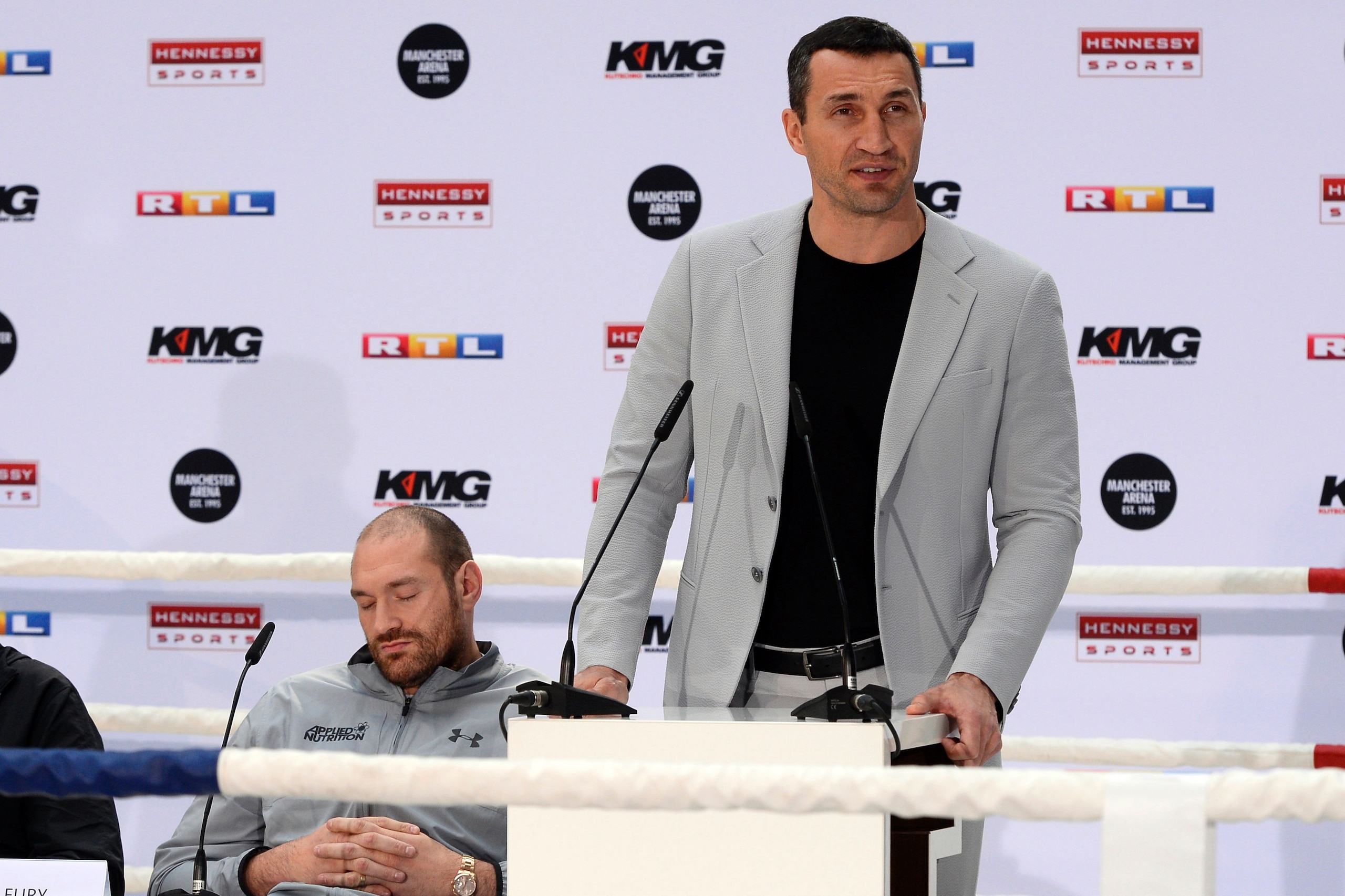 Ukrainian boxer Wladimir Klitschko (R) and British heavyweight world champion Tyson Fury give a press conference in Cologne, western Germany, on April 28, 2016, where they talked about their re-match-fight for the title to take place on July 9, 2016 in Manchester, Great Britain.
Hamburg-based Klitschko lost his WBA, IBF, IBO and WBO belts to Britain's Fury on points in Duesseldorf in November 2015 as the Ukrainian suffered his first defeat in more than a decade. / AFP / Roberto Pfeil        (Photo credit should read ROBERTO PFEIL/AFP/Getty Images)