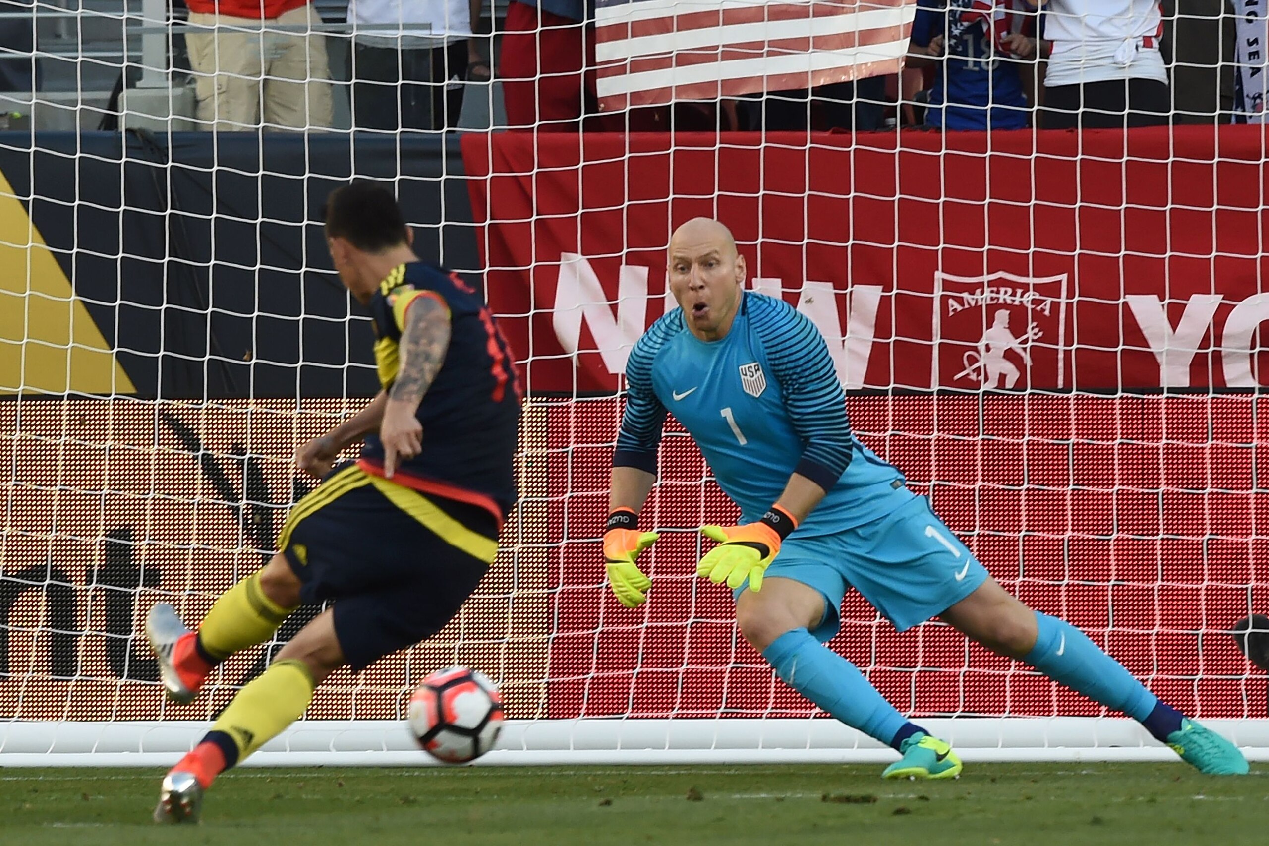 Colombia's James Rodriguez scores a penalty past USA's goalkeeper Brad Guzan during the Copa America Centenario football tournament match in Santa Clara, California, United States, on June 3, 2016. / AFP / MARK RALSTON        (Photo credit should read MARK RALSTON/AFP/Getty Images)