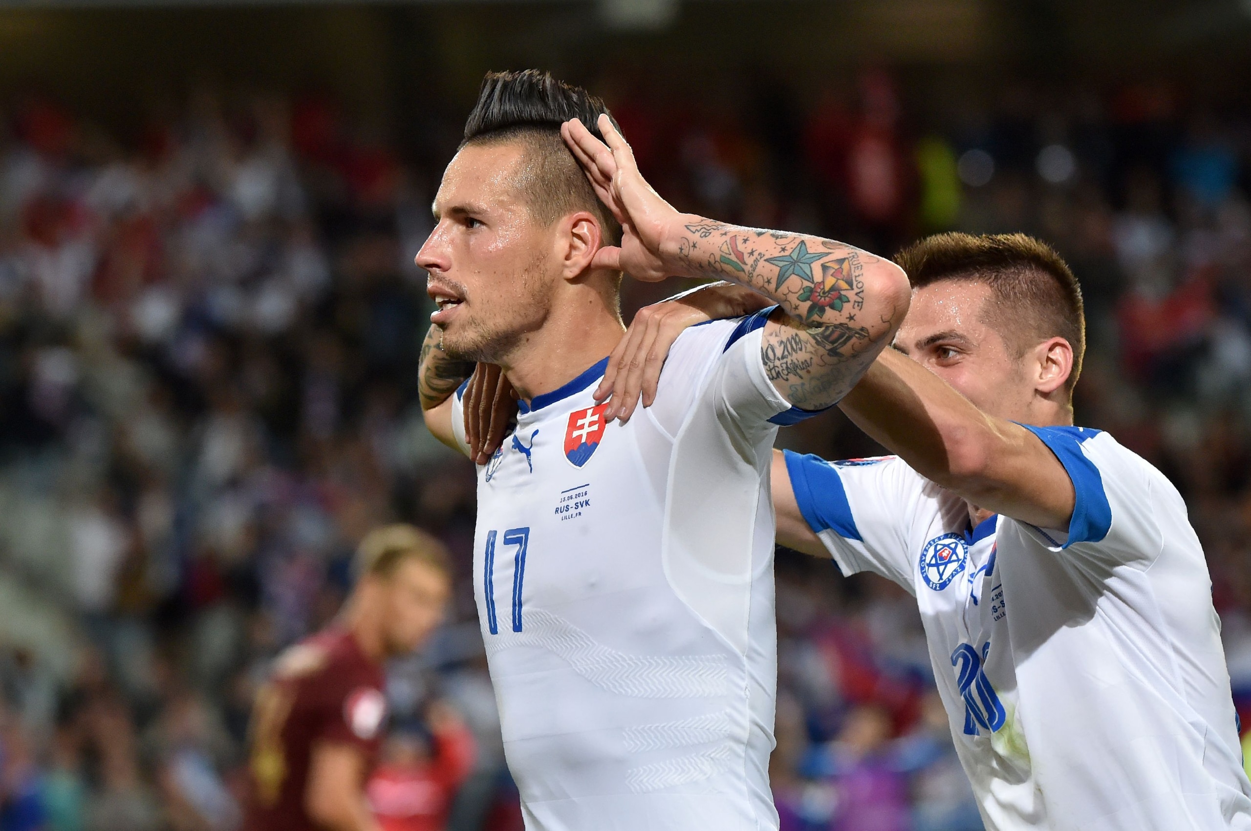 Slovakia's midfielder Marek Hamsik celebrates his goal during the Euro 2016 group B football match between Russia and Slovakia at the Pierre-Mauroy Stadium in Villeneuve-d'Ascq, near Lille, on June 15, 2016. / AFP / PHILIPPE HUGUEN        (Photo credit should read PHILIPPE HUGUEN/AFP/Getty Images)