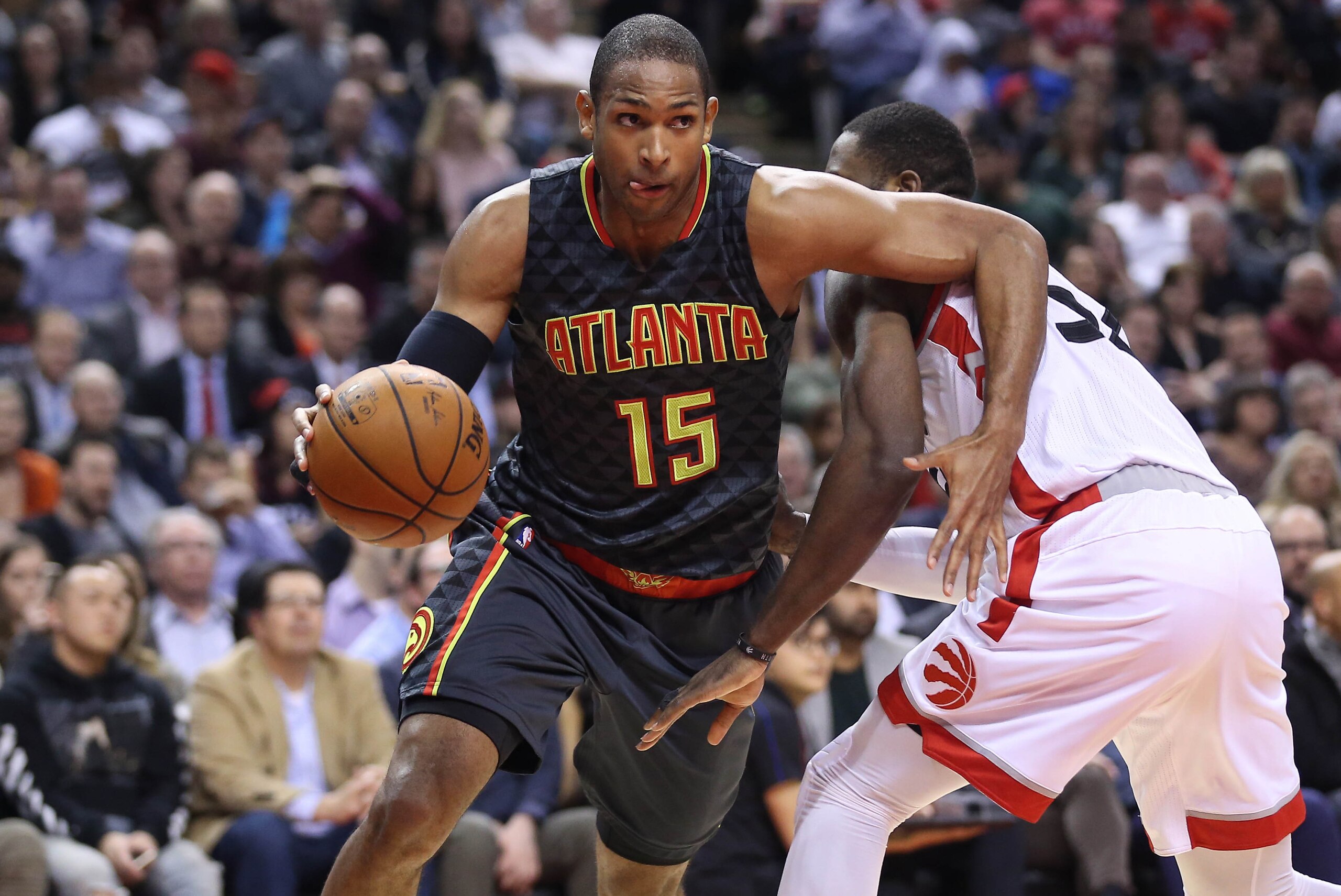 Mar 10, 2016; Toronto, Ontario, CAN; Atlanta Hawks forward Al Horford (15) goes to the basket against the Toronto Raptors at Air Canada Centre. The Raptors beat the Hawks 104-96. Mandatory Credit: Tom Szczerbowski-USA TODAY Sports