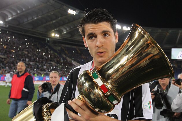 ROME, ITALY - MAY 21:  Alvaro Morata of Juventus FC celebrates with the trophy after winning the TIM Cup final match against AC Milan at Stadio Olimpico on May 21, 2016 in Rome, Italy.  (Photo by Paolo Bruno/Getty Images)