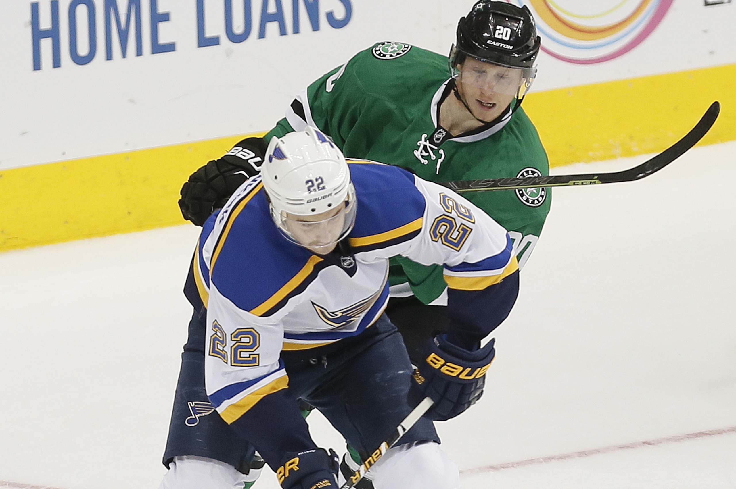 St. Louis Blues defenseman Kevin Shattenkirk (22) and Dallas Stars forward Cody Eakin (20) battle for the puck during the first period of an NHL hockey game Saturday, March 12, 2016, in Dallas. St. Louis won 5-4 in overtime. (AP Photo/Brandon Wade) St. Louis Blues defenseman Kevin Shattenkirk (22) and Dallas Stars forward Cody Eakin (20) battle for the puck during the first period of an NHL hockey game Saturday, March 12, 2016, in Dallas. St. Louis won 5-4 in overtime. (AP Photo/Brandon Wade)