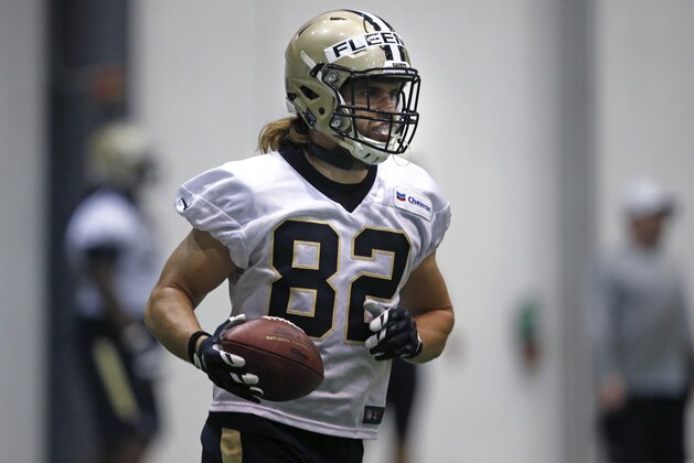 New Orleans Saints tight end Coby Fleener (82) goes through drills during NFL football practice in Metairie, La., Thursday, June 2, 2016. (AP Photo/Gerald Herbert)