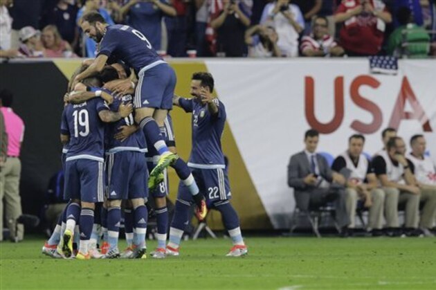 Argentina midfielder Lionel Messi (10) celebrates with teammates after his goal against the United States during a Copa America Centenario semifinal soccer match, Tuesday, June 21, 2016, in Houston. (AP Photo/Eric Gay)