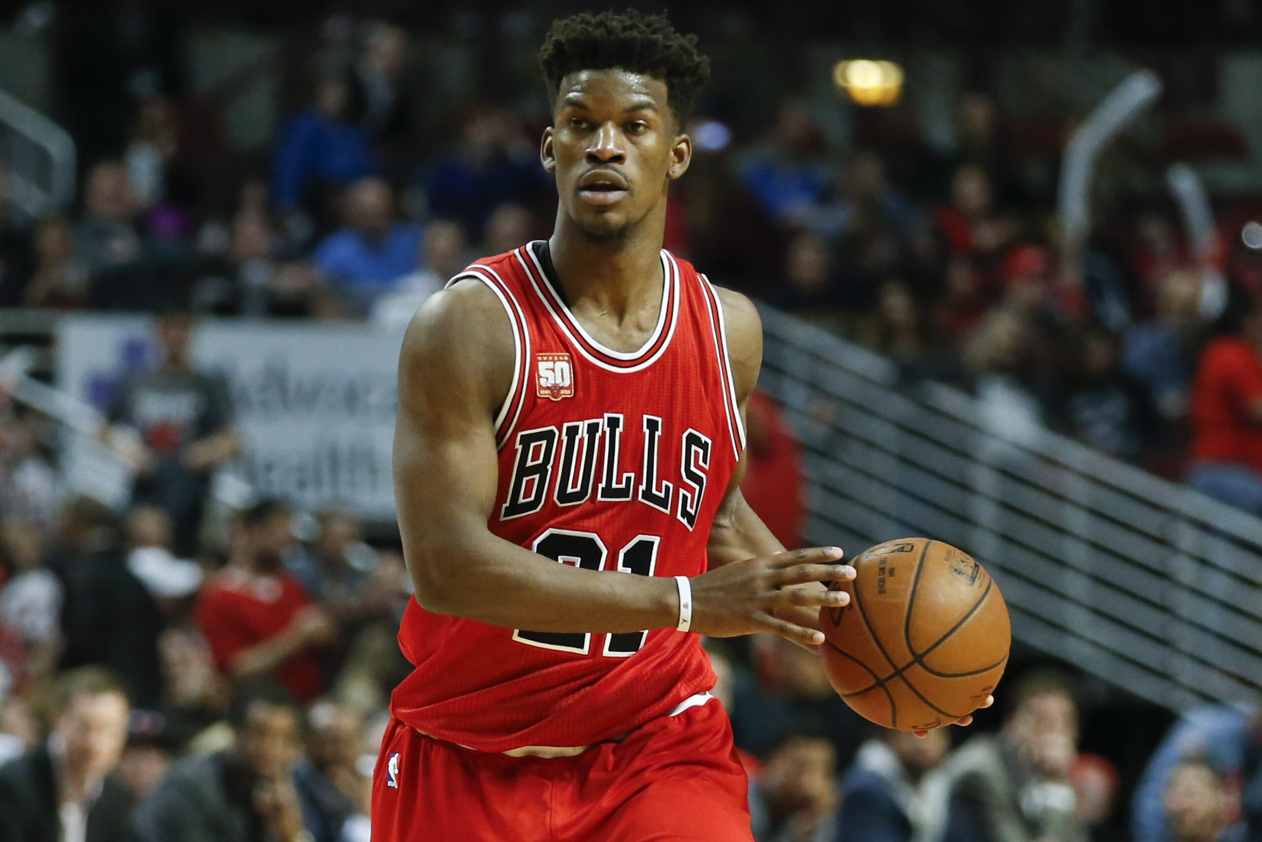 Chicago Bulls guard Jimmy Butler looks to pass the ball against the Philadelphia 76ers during the second half of an NBA basketball game, Wednesday, April 13, 2016 in Chicago. The Bulls won 115-105. (AP Photo/Kamil Krzaczynski)