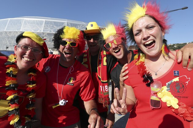 Belgium's soccer team fans cheer ahead of the Euro 2016 Group E soccer match between Sweden and Belgium at the Allianz Riviera stadium in Nice, France, Wednesday, June 22, 2016. (AP Photo/Claude Paris)