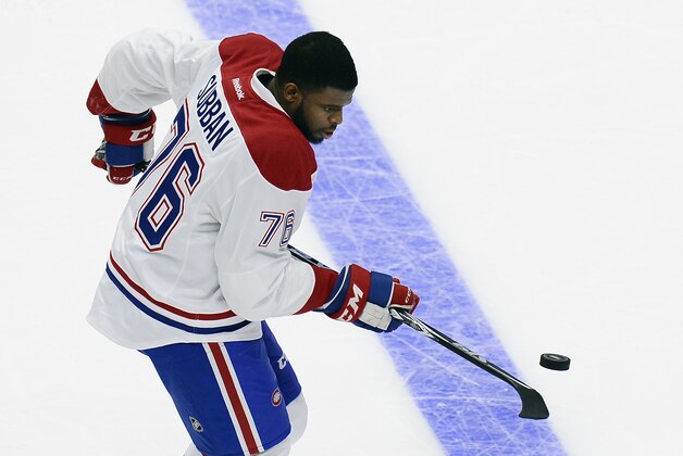 Montreal Canadiens defenseman P. K. Subban bounces the puck off his stick as he competes in the breakaway challenge at the NHL hockey All-Star game skills competition Saturday, Jan. 30, 2016, in Nashville, Tenn.(AP Photo/Mark Zaleski)