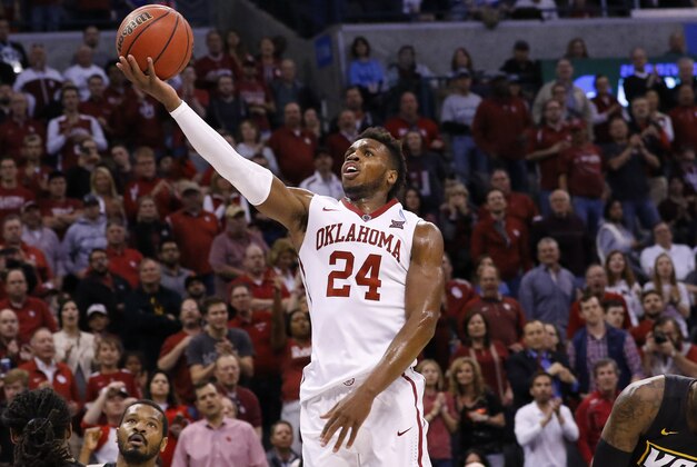 Oklahoma guard Buddy Hield (24) goes up for a basket against VCU in the second half during a second-round men's college basketball game in the NCAA Tournament in Oklahoma City, Sunday, March 20, 2016. Oklahoma won 85-81. (AP Photo/Alonzo Adams)
