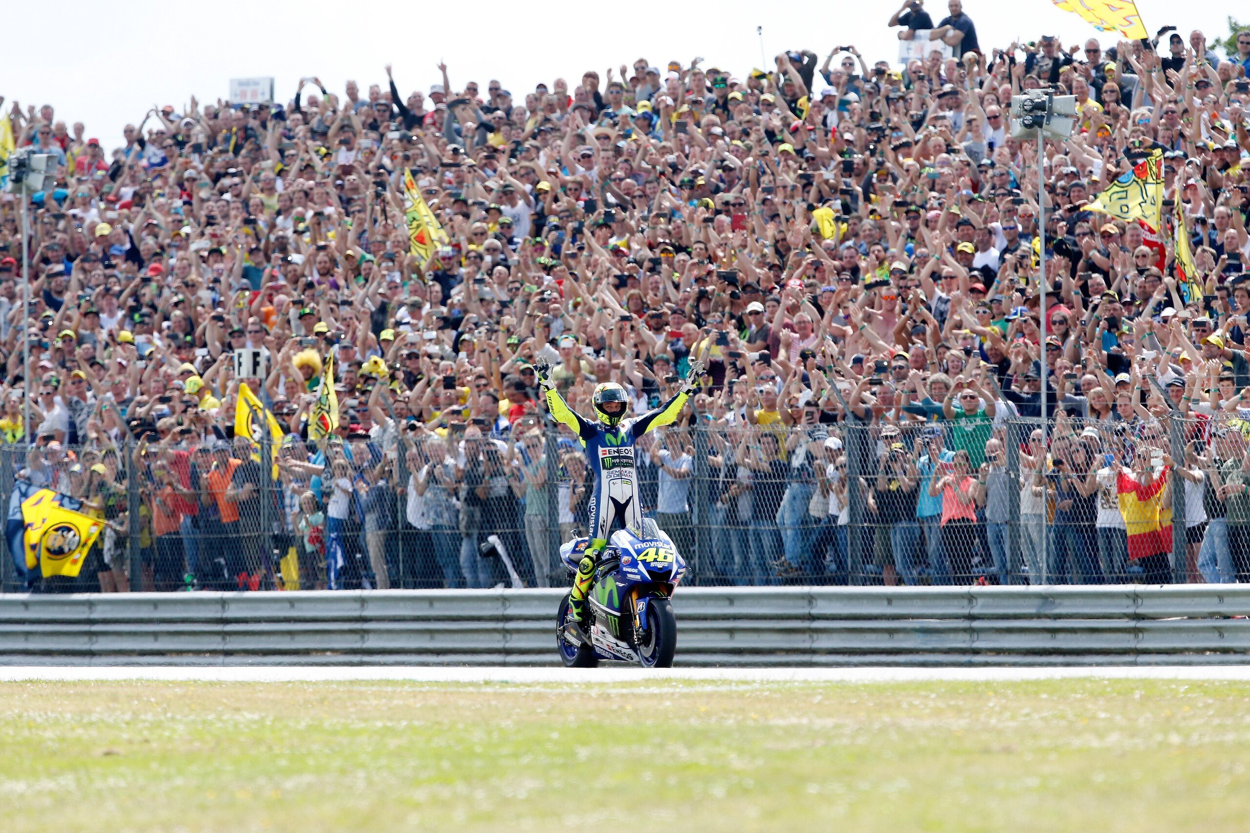 Italian MotoGP rider Valentino Rossi of the Movistar Yamaha MotoGP team celebrates after winning the Motorcycling Grand Prix TT Assen at the TT Circuit in Assen on June 27, 2015. AFP PHOTO / ANP / BAS CZERWINSKI ***NETHERLANDS OUT*** (Photo credit should read BAS CZERWINSKI/AFP/Getty Images) Italian MotoGP rider Valentino Rossi of the Movistar Yamaha MotoGP team celebrates after winning the Motorcycling Grand Prix TT Assen at the TT Circuit in Assen on June 27, 2015. AFP PHOTO / ANP / BAS CZERWINSKI ***NETHERLANDS OUT*** (Photo credit should read BAS CZERWINSKI/AFP/Getty Images)