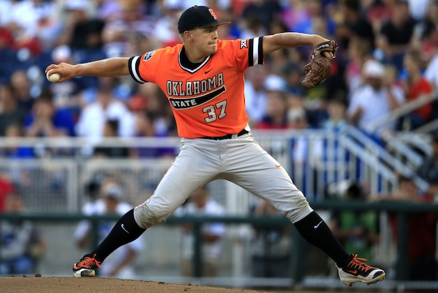 Oklahoma State starting pitcher Tyler Buffett throws during the first inning of an NCAA College World Series baseball game against Arizona, Monday, June 20, 2016, in Omaha, Neb. (AP Photo/Nati Harnik)