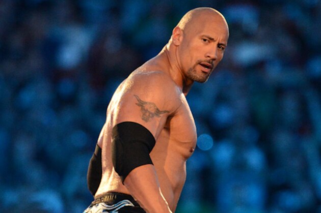 MIAMI GARDENS, FL - APRIL 1: Dwayne ''The Rock'' Johnson looks on during his match against John Cena during WrestleMania XXVIII at Sun Life Stadium on April 1, 2012 in Miami Gardens, Florida. (Photo by Ron Elkman/Sports Imagery/Getty Images)