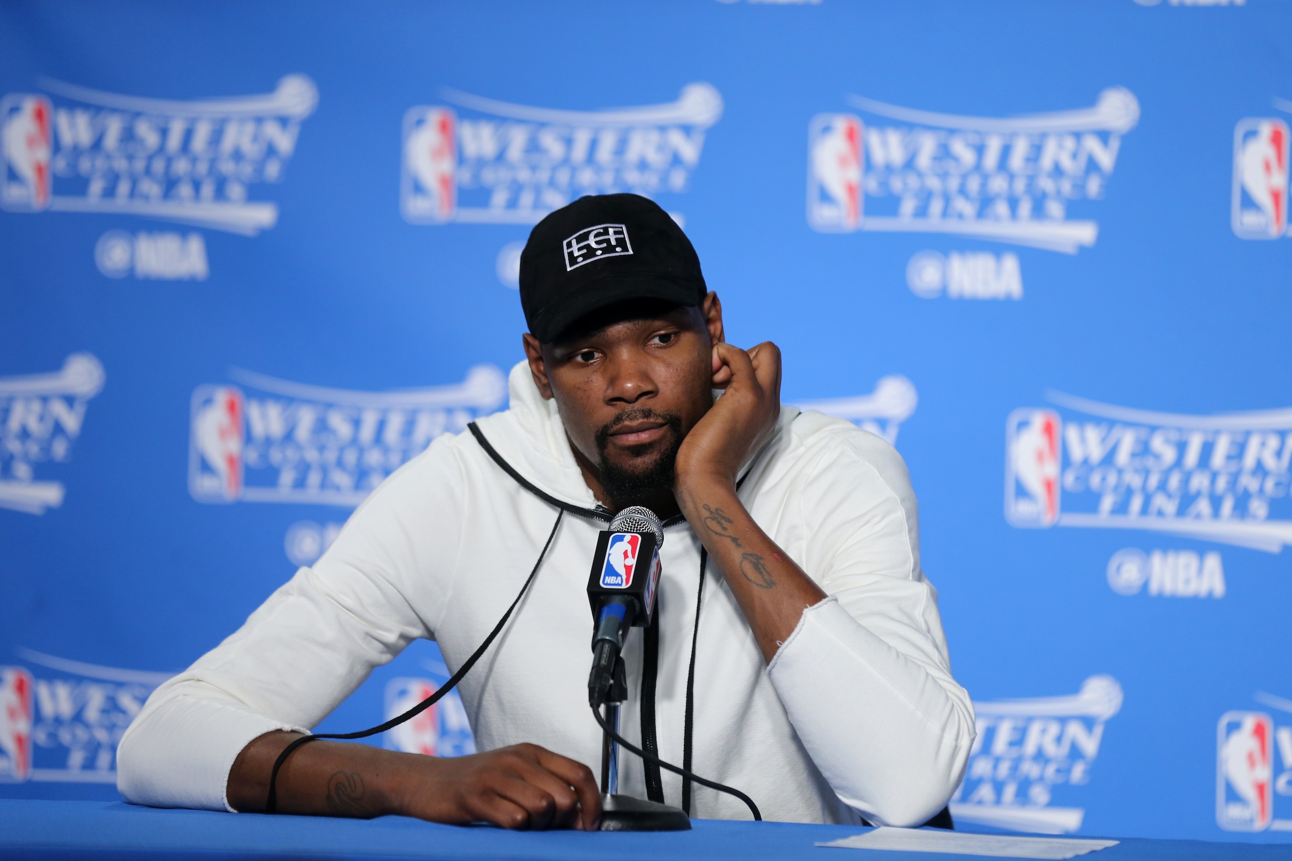 OAKLAND, CA - MAY 30:  Kevin Durant #35 of the Oklahoma City Thunder talks to the media after Game Seven of the Western Conference Finals against the Golden State Warriors during the 2016 NBA Playoffs on May 30, 2016 at Oracle Arena in Oakland, California. NOTE TO USER: User expressly acknowledges and agrees that, by downloading and or using this photograph, user is consenting to the terms and conditions of Getty Images License Agreement. Mandatory Copyright Notice: Copyright 2016 NBAE (Photo by Layne Murdoch/NBAE via Getty Images)