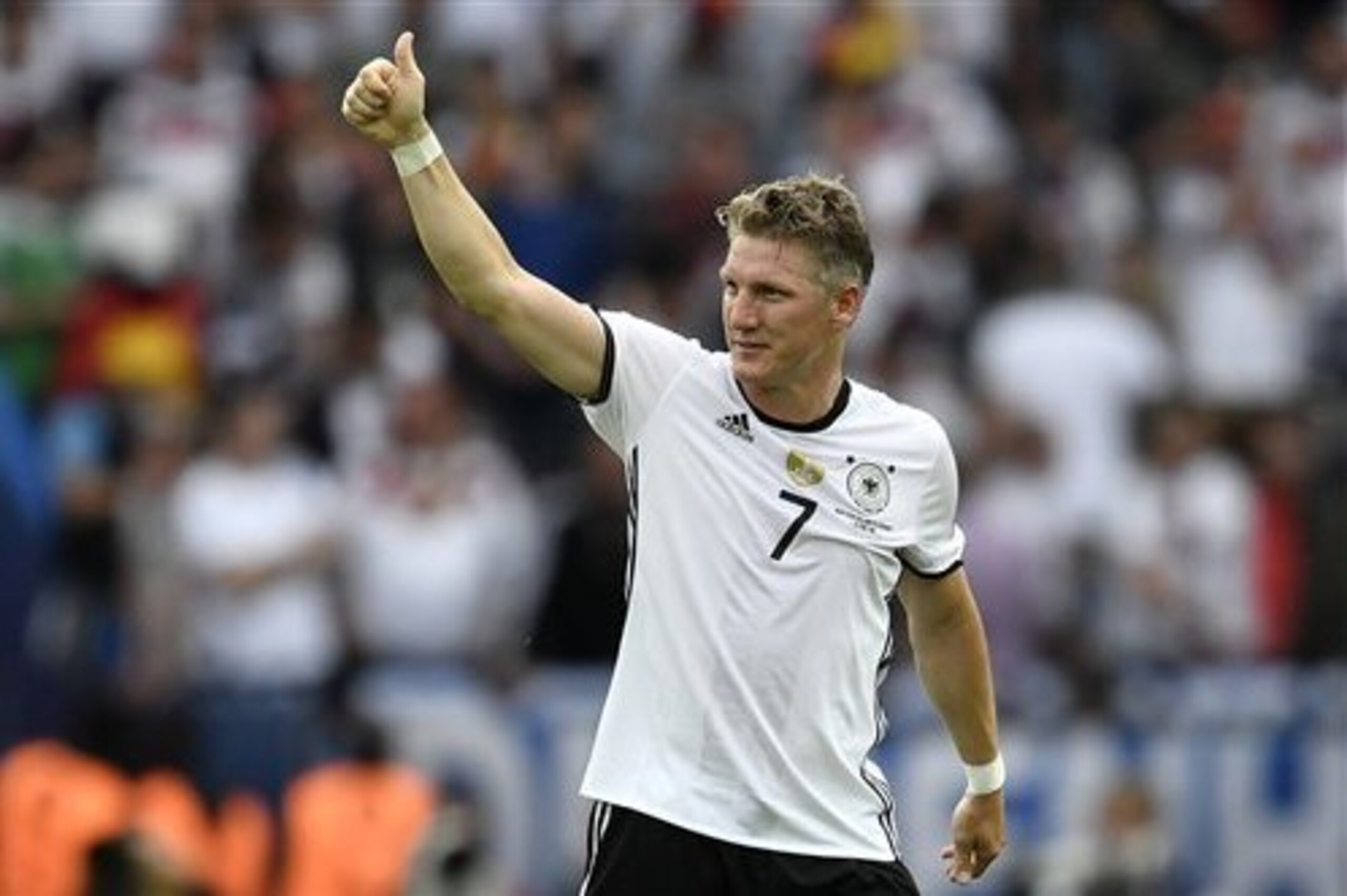 Germany's Bastian Schweinsteiger gestures at the end of the Euro 2016 Group C soccer match between Northern Ireland and Germany at the Parc des Princes stadium in Paris, France, Tuesday, June 21, 2016. (AP Photo/Martin Meissner)