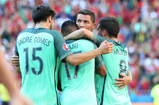 LYON, FRANCE - JUNE 22: Cristiano Ronaldo of Portugal celebrates Nani's goal during the UEFA EURO 2016 Group F match between Hungary and Portugal at Stade des Lumieres on June 22, 2016 in Lyon, France. (Photo by Jean Catuffe/Getty Images)