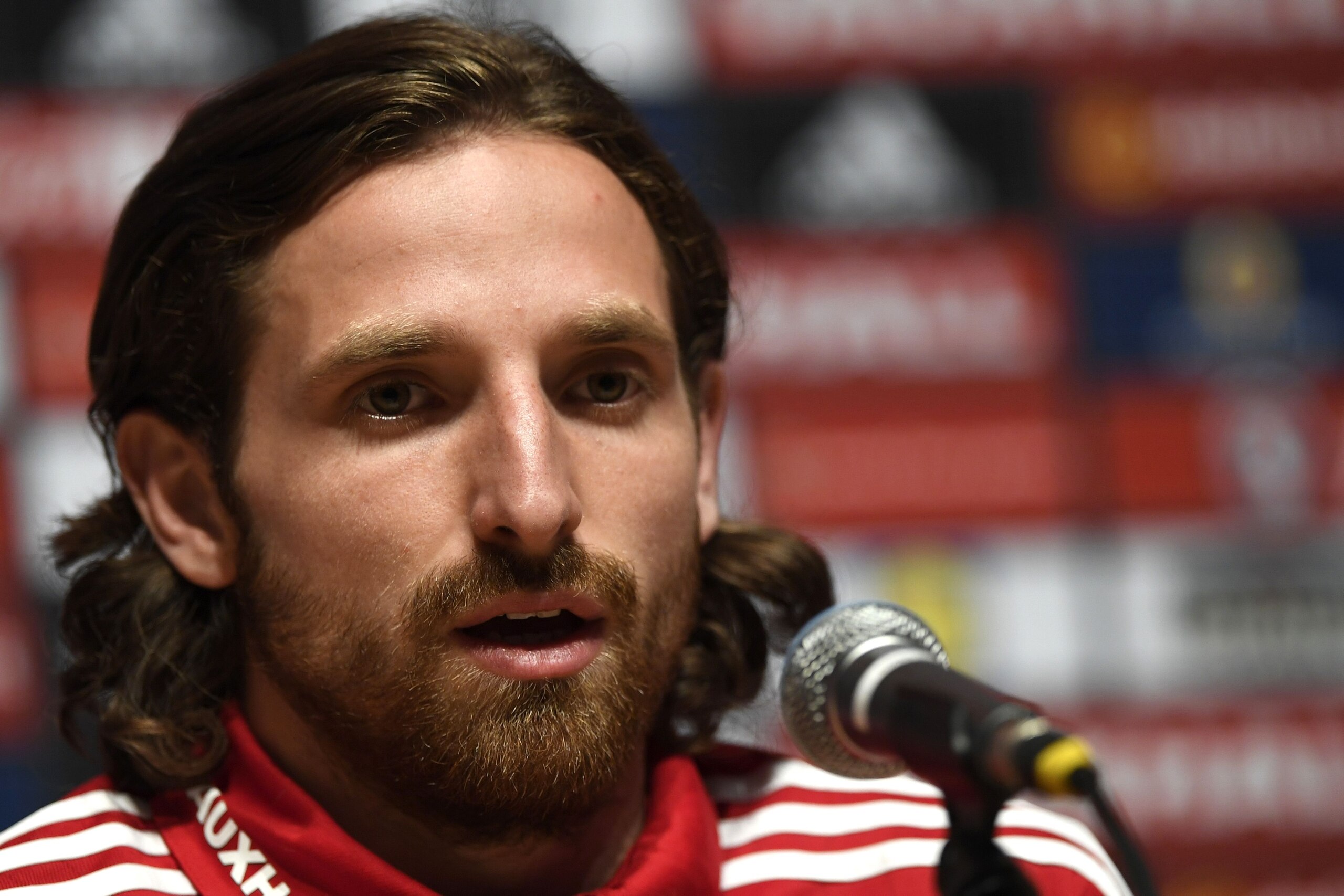 Wales' midfielder Joe Allen attends a press conference in Dinard, Western France, on June 18, 2016, during the Euro 2016 football tournament. / AFP / DAMIEN MEYER (Photo credit should read DAMIEN MEYER/AFP/Getty Images) Wales' midfielder Joe Allen attends a press conference in Dinard, Western France, on June 18, 2016, during the Euro 2016 football tournament. / AFP / DAMIEN MEYER (Photo credit should read DAMIEN MEYER/AFP/Getty Images)