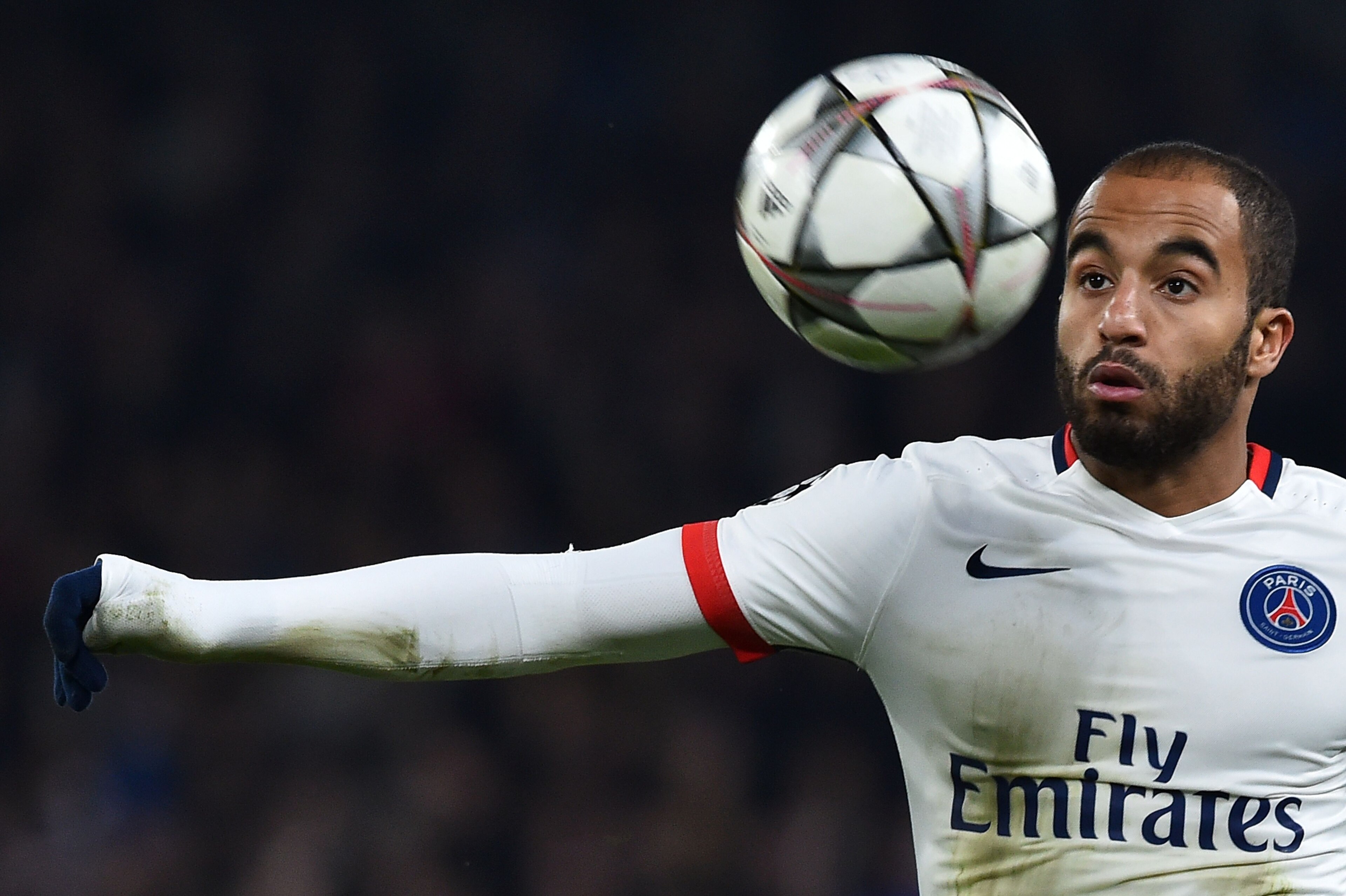 Paris Saint-Germain's Brazilian midfielder Lucas Moura eyes the ball during the UEFA Champions League round of 16 second leg football match between Chelsea and Paris Saint-Germain (PSG) at Stamford Bridge in London on March 9, 2016.  / AFP / BEN STANSALL        (Photo credit should read BEN STANSALL/AFP/Getty Images)