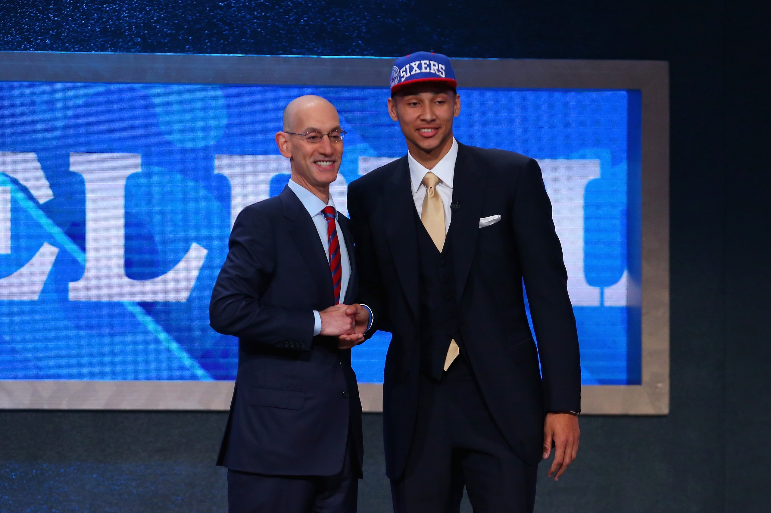 NEW YORK, NY - JUNE 23:  Ben Simmons poses with Commissioner Adam Silver after being drafted first overall by the Philadelphia 76ers in the first round of the 2016 NBA Draft at the Barclays Center on June 23, 2016 in the Brooklyn borough of New York City. NOTE TO USER: User expressly acknowledges and agrees that, by downloading and or using this photograph, User is consenting to the terms and conditions of the Getty Images License Agreement.  (Photo by Mike Stobe/Getty Images)