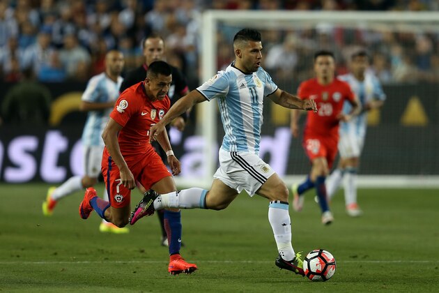 SANTA CLARA, CA - JUNE 06: Sergio Aguero of Argentina in action with Alexis Sanchez of Chile during the Copa America Centenario Group D match between Argentina and Chile at Levi's Stadium on June 6, 2016 in Santa Clara, California. (Photo by Chris Brunskill Ltd/Getty Images)