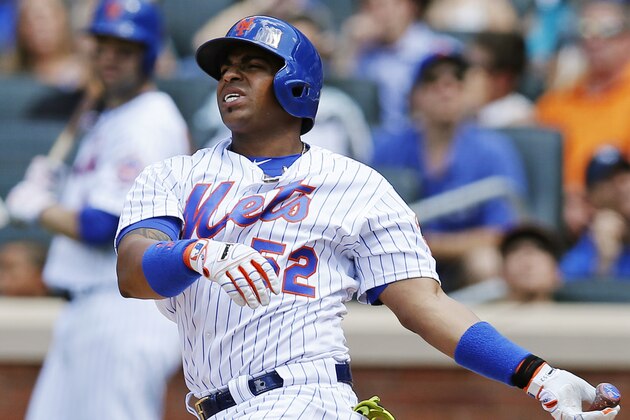New York Mets Yoenis Cespedes (52) reacts in his fifth-inning at-bat during an interleague baseball game against the Kansas City Royals, Wednesday, June 22, 2016, in New York. Cespedes left the game with discomfort in his left wrist. (AP Photo/Kathy Willens)