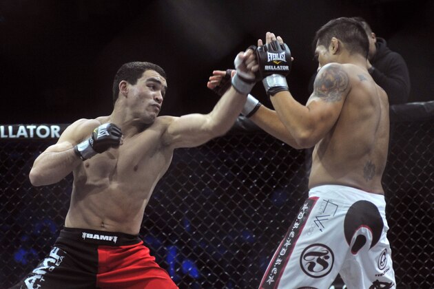 UNCASVILLE, CT - APRIL 02:  Patricky Freire punches Toby Imada at Bellator 39 at the Mohegan Sun Arena on April 2, 2011 in Uncasville, Connecticut.  (Photo by Henry S. Dziekan III/Getty Images)