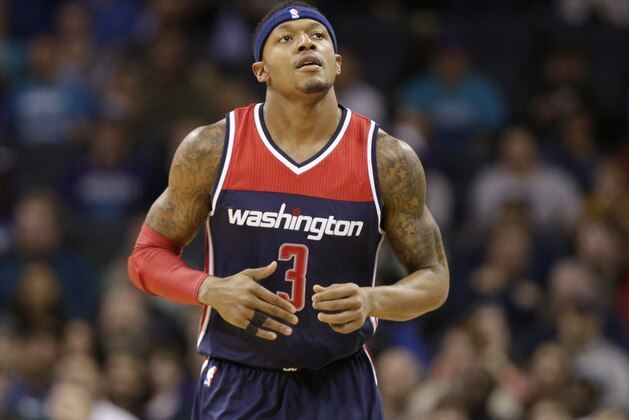 Washington Wizards' Bradley Beal (3) runs down the court in the first half of an NBA basketball game against the Charlotte Hornets in Charlotte, N.C., Wednesday, Nov. 25, 2015. (AP Photo/Chuck Burton)