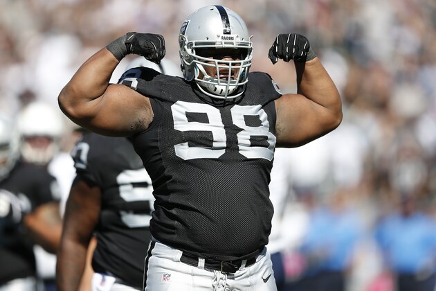 OAKLAND, CA - OCTOBER 12:  C.J. Wilson #98 of the Oakland Raiders celebrates after he sacked quarterback Philip Rivers #17 of the San Diego Chargers during the first quarter at the O.co Coliseum in Oakland, California.  (Photo by Thearon W. Henderson/Getty Images)
