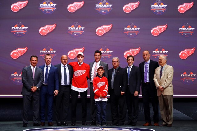 BUFFALO, NY - JUNE 24:  Dennis Cholowski celebrates with the Detroit Red Wings after being selected 20th overall during round one of the 2016 NHL Draft on June 24, 2016 in Buffalo, New York.  (Photo by Bruce Bennett/Getty Images)