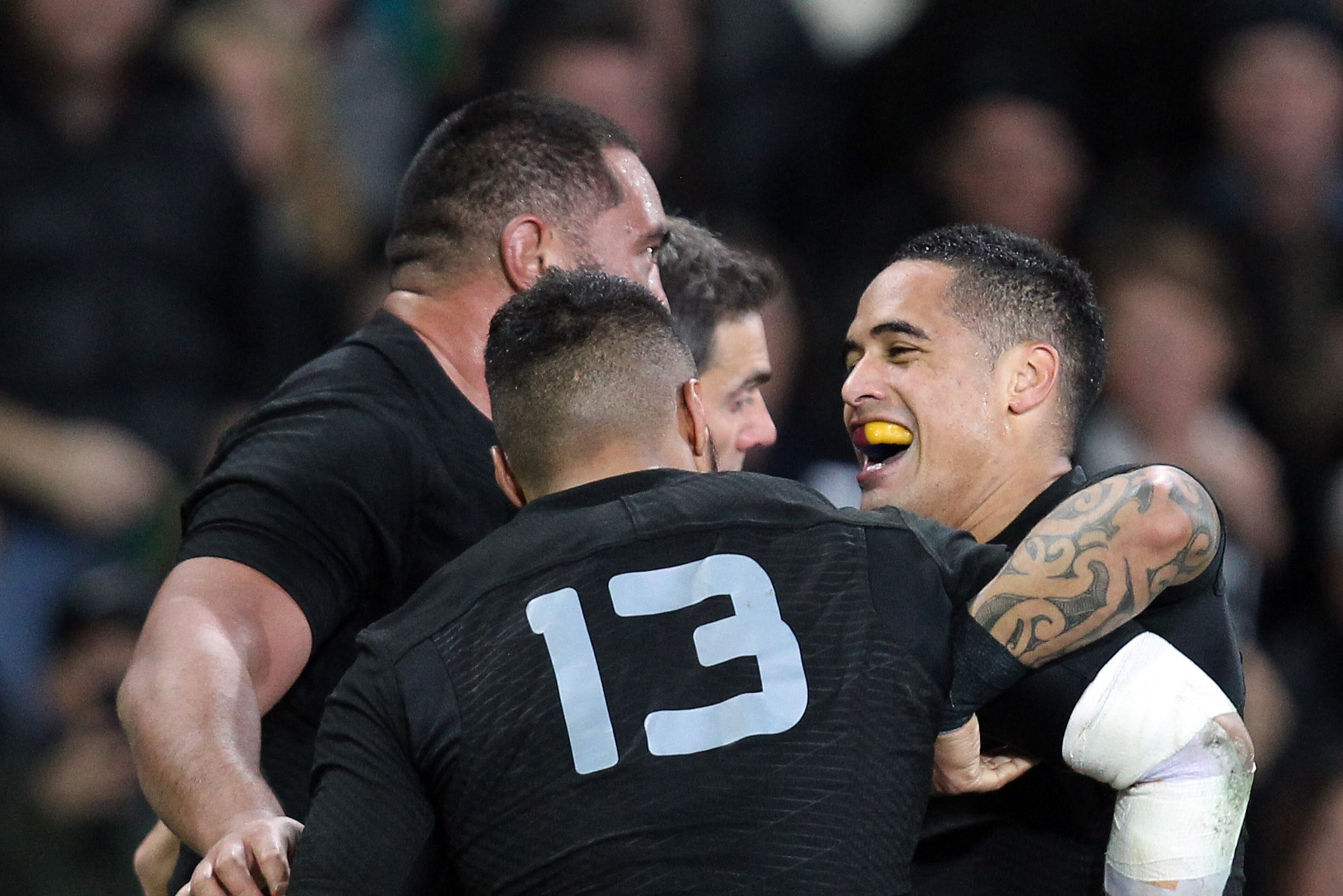 DUNEDIN, NEW ZEALAND - JUNE 25: Aaron Smith of New Zealand celebrates the try of George Moala  during the International Test match between the New Zealand All Blacks and Wales at Forsyth Barr Stadium on June 25, 2016 in Dunedin, New Zealand.  (Photo by Rob Jefferies/Getty Images)