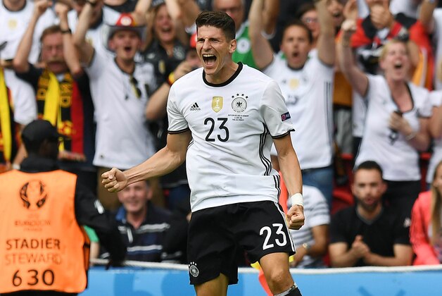 PARIS, FRANCE - JUNE 21: Mario Gomez of Germany celebrates after scoring during the UEFA EURO 2016 Group C match between Northern Ireland and Germany at Parc des Princes on June 21, 2016 in Paris, France. (Photo by Charles McQuillan/Getty Images)