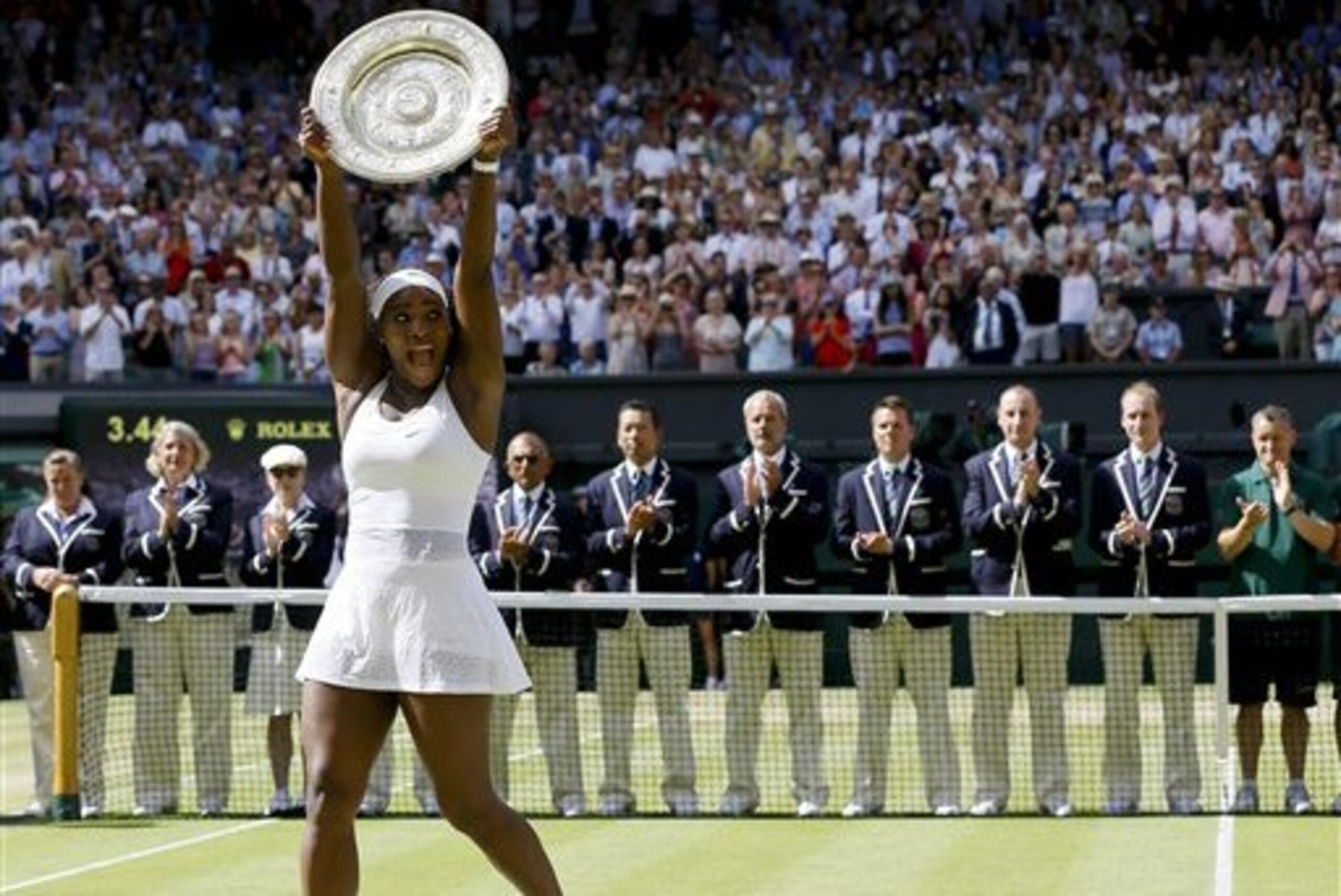 FILE - In this July 11, 2015, file photo, Serena Williams, of the United States, holds up the trophy after winning the women's singles final against Garbine Muguruza, of Spain, at the All England Lawn Tennis Championships in Wimbledon, Prize money at Wimbledon is increasing 5 percent this year, with the men's and women's singles champions to receive 2 million pounds ($2.9 million). Organizers announced Tuesday, April 26, 2016 that total prize money for the grass-court Grand Slam is going up to 28.1 million pounds ($40 million). The prize for the singles champions has been raised by 6.4 percent, or 120,000 pounds ($175,000). (AP Photo/Kirsty Wigglesworth, File) FILE - In this July 11, 2015, file photo, Serena Williams, of the United States, holds up the trophy after winning the women's singles final against Garbine Muguruza, of Spain, at the All England Lawn Tennis Championships in Wimbledon, Prize money at Wimbledon is increasing 5 percent this year, with the men's and women's singles champions to receive 2 million pounds ($2.9 million). Organizers announced Tuesday, April 26, 2016 that total prize money for the grass-court Grand Slam is going up to 28.1 million pounds ($40 million). The prize for the singles champions has been raised by 6.4 percent, or 120,000 pounds ($175,000). (AP Photo/Kirsty Wigglesworth, File)