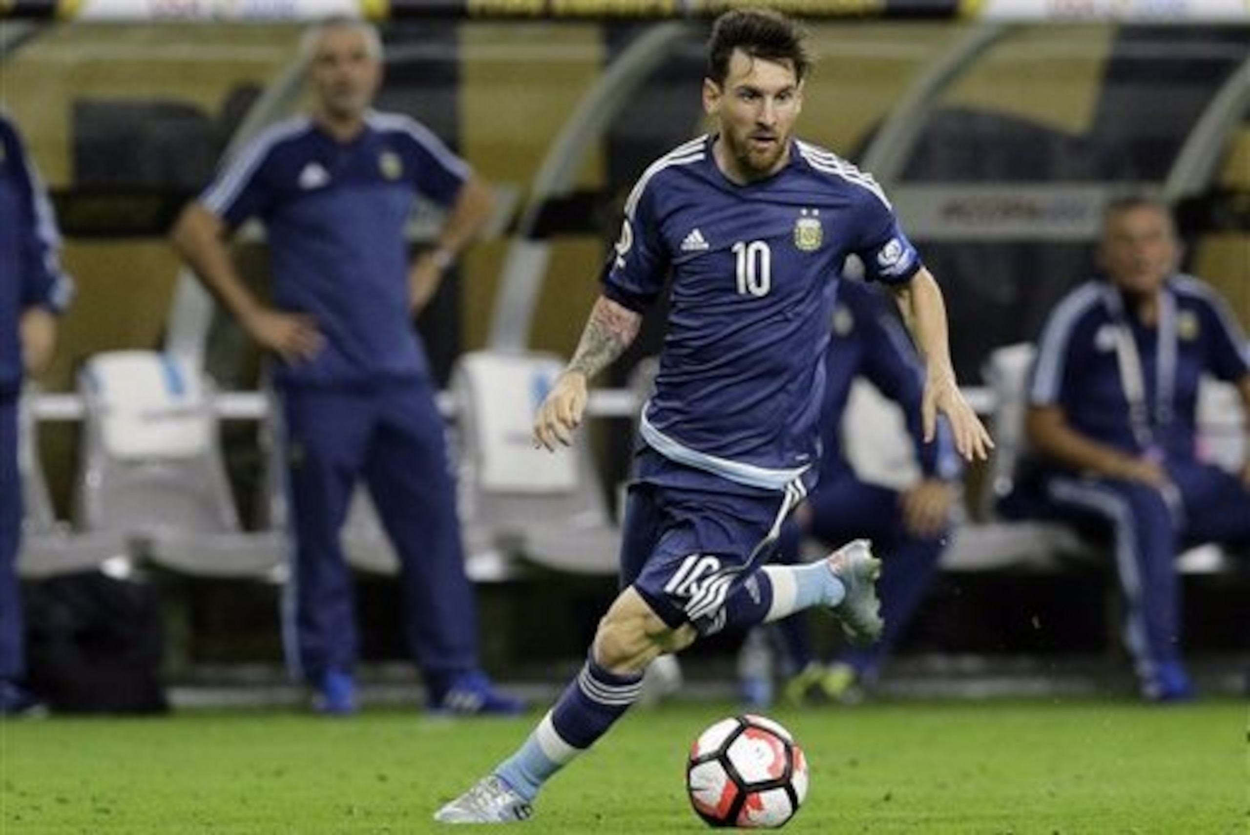 Argentina midfielder Lionel Messi (10) moves the ball upfield against the United States during a Copa America Centenario semifinal soccer match, Tuesday, June 21, 2016, in Houston. (AP Photo/Eric Gay) Argentina midfielder Lionel Messi (10) moves the ball upfield against the United States during a Copa America Centenario semifinal soccer match, Tuesday, June 21, 2016, in Houston. (AP Photo/Eric Gay)