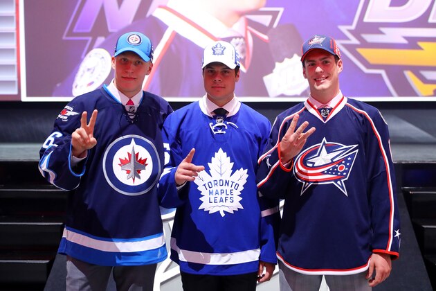 BUFFALO, NY - JUNE 24:  Winnepegs Jets second overall pick Patrik Laine, Toronto Maple Leafs first overall pick Auston Matthews and Columbus Blue Jackets third overall pick Pierre-Luc Dubois celebrate during round one of the 2016 NHL Draft on June 24, 2016 in Buffalo, New York.  (Photo by Bruce Bennett/Getty Images)