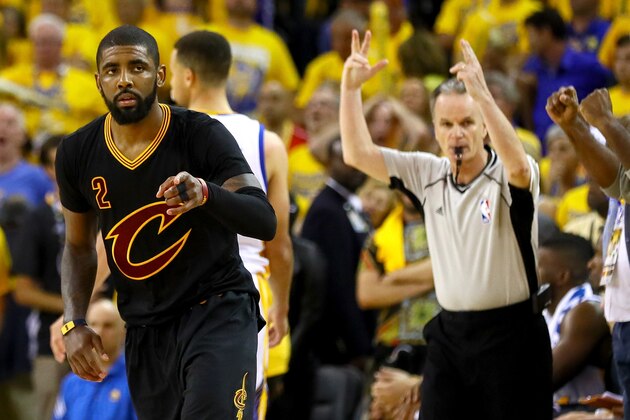OAKLAND, CA - JUNE 19:  Kyrie Irving #2 of the Cleveland Cavaliers reacts after a three-point basket against the Golden State Warriors in Game 7 of the 2016 NBA Finals at ORACLE Arena on June 19, 2016 in Oakland, California. NOTE TO USER: User expressly acknowledges and agrees that, by downloading and or using this photograph, User is consenting to the terms and conditions of the Getty Images License Agreement.  (Photo by Ezra Shaw/Getty Images)