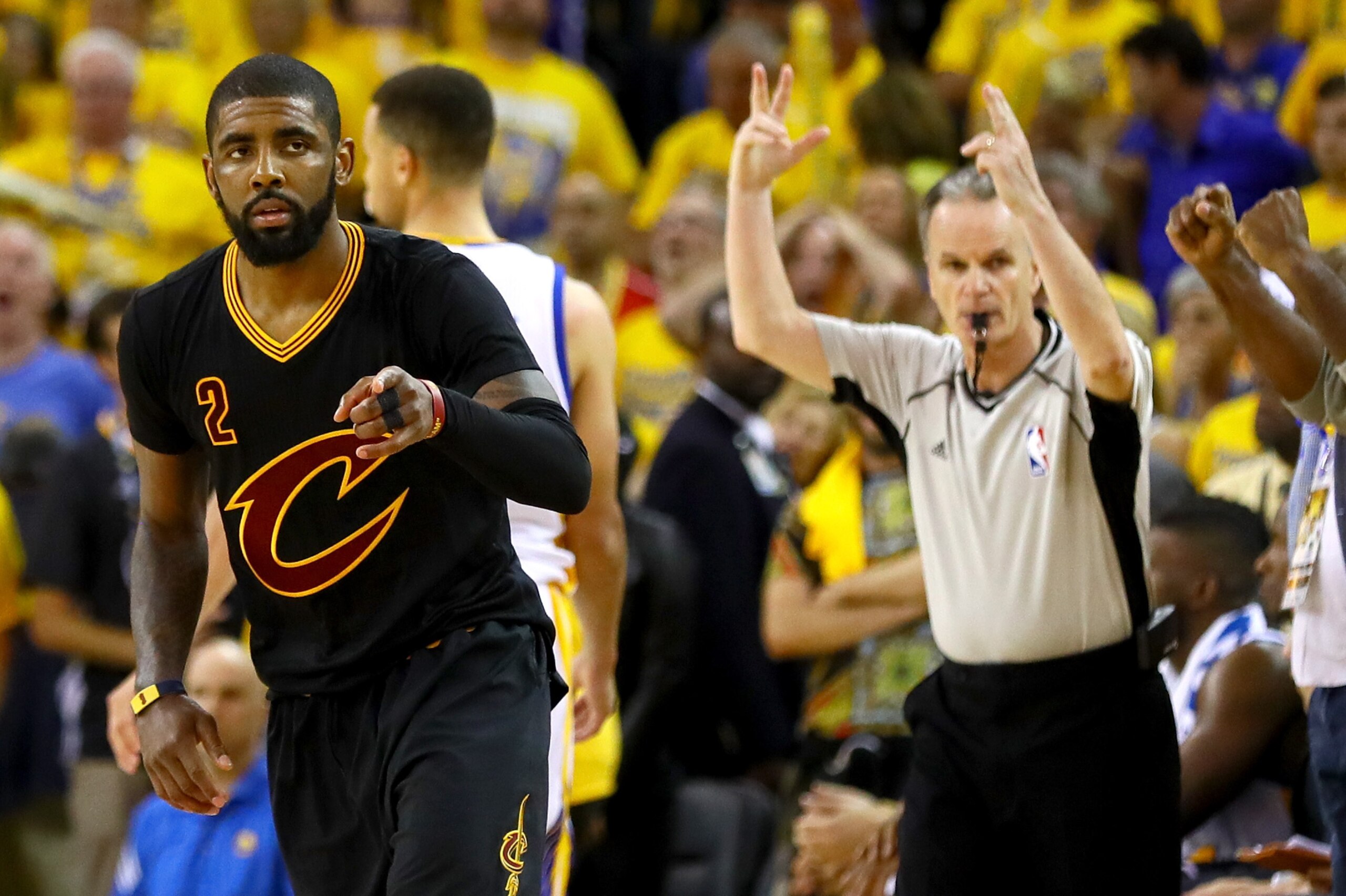 OAKLAND, CA - JUNE 19: Kyrie Irving #2 of the Cleveland Cavaliers reacts after a three-point basket against the Golden State Warriors in Game 7 of the 2016 NBA Finals at ORACLE Arena on June 19, 2016 in Oakland, California. NOTE TO USER: User expressly acknowledges and agrees that, by downloading and or using this photograph, User is consenting to the terms and conditions of the Getty Images License Agreement. (Photo by Ezra Shaw/Getty Images) OAKLAND, CA - JUNE 19: Kyrie Irving #2 of the Cleveland Cavaliers reacts after a three-point basket against the Golden State Warriors in Game 7 of the 2016 NBA Finals at ORACLE Arena on June 19, 2016 in Oakland, California. NOTE TO USER: User expressly acknowledges and agrees that, by downloading and or using this photograph, User is consenting to the terms and conditions of the Getty Images License Agreement. (Photo by Ezra Shaw/Getty Images)