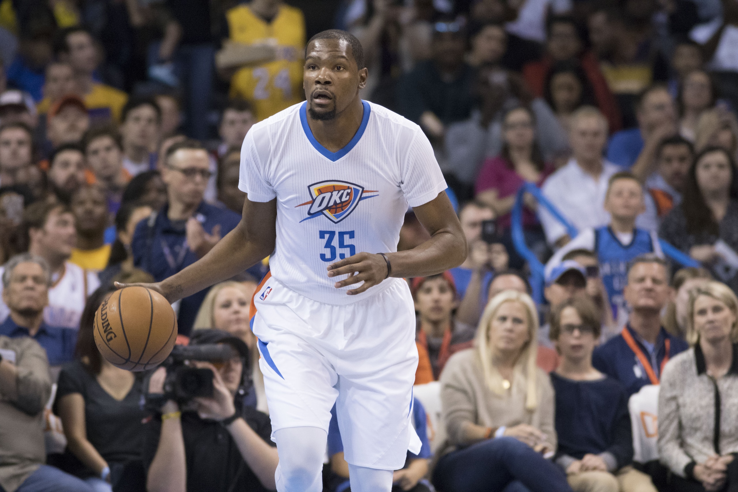 OKLAHOMA CITY, OK - APRIL 11: Kevin Durant #35 of the Oklahoma City Thunder brings the ball down court against the Los Angeles Lakers during a NBA game at the Chesapeake Energy Arena on April 11, 2016 in Oklahoma City, Oklahoma. NOTE TO USER: User expressly acknowledges and agrees that, by downloading and or using this photograph, User is consenting to the terms and conditions of the Getty Images License Agreement. (Photo by J Pat Carter/Getty Images)
