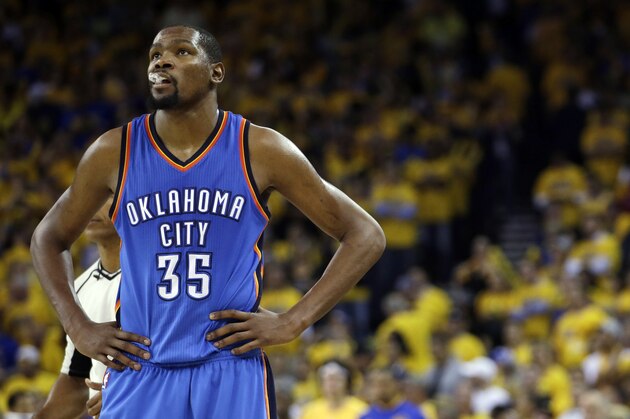 FILE - In this May 26, 2016, file photo, Oklahoma City Thunder's Kevin Durant watches during the closing minutes of the second half in Game 5 of the NBA basketball Western Conference finals against the Golden State Warriors in Oakland, Calif. Durant may not be ready to talk about his free agency yet, but it's one of the biggest issues facing the Oklahoma City Thunder after losing in seven games of the Western Conference finals to Golden State. (AP Photo/Marcio Jose Sanchez, File)