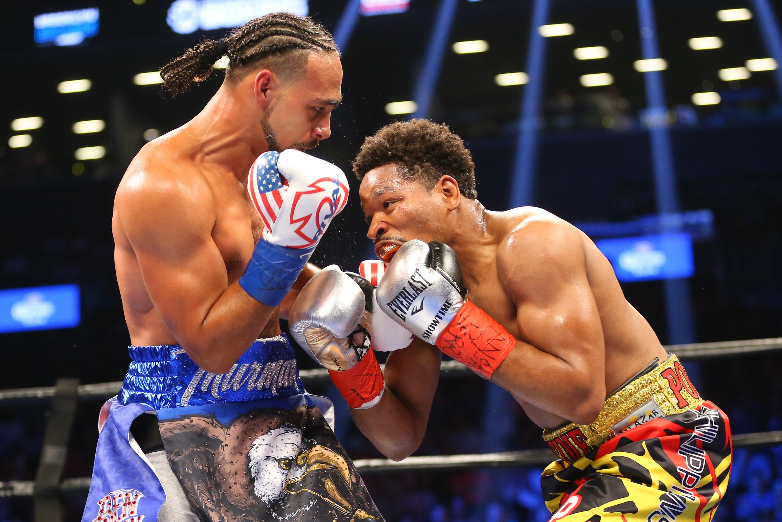 BROOKLYN, NY - JUNE 25: Keith Thurman (left) and Shawn Porter (right) trade punches during their 12 round WBA welterweight championship bout at the Barclays Center on June 25, 2016 in the Brooklyn borough of New York City. (Photo by Ed Mulholland/Getty Images)