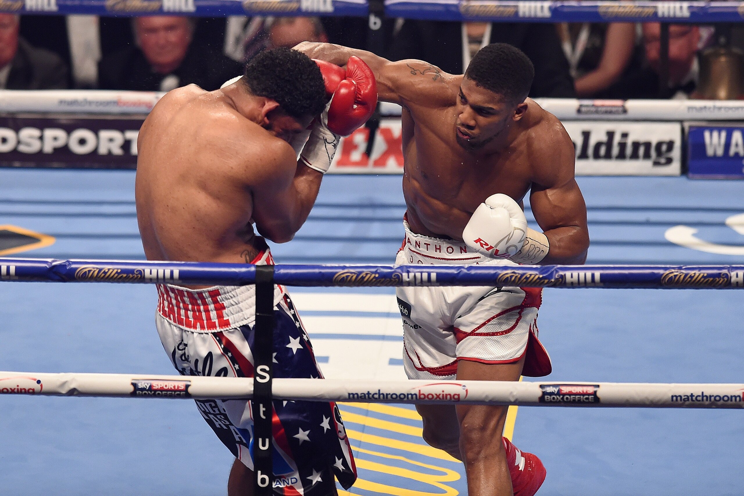 LONDON, ENGLAND - JUNE 25: Dominic Breazeale cowers away after Anthony Joshua throws a right hand punch during their bout for the IBF World Heavyweight Title at The O2 Arena on June 25, 2016 in London, England. (Photo by Leigh Dawney/Getty Images)