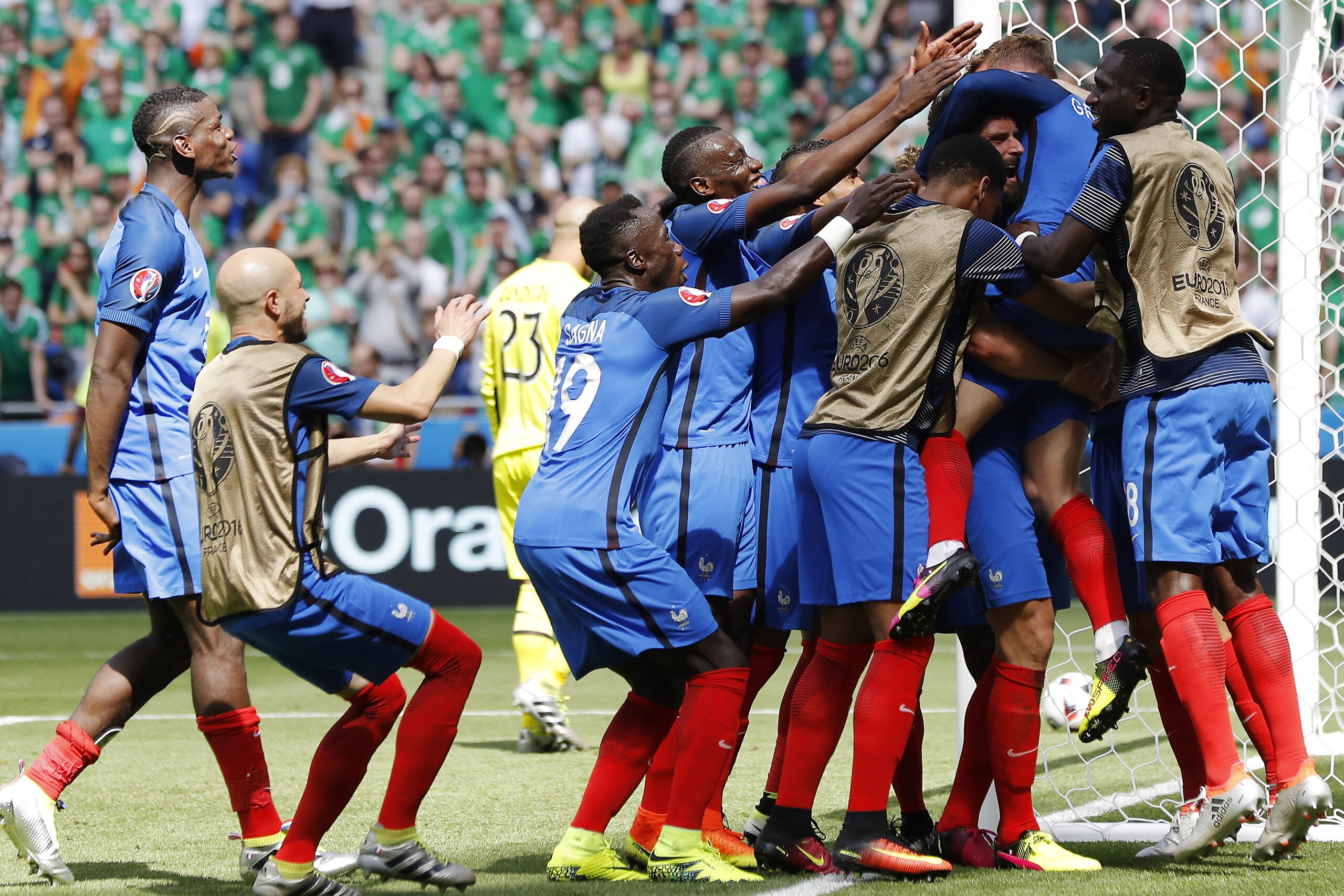 France's Antoine Griezmann is celebrated by teammates after scoring his side's second goal during the Euro 2016 round of 16 soccer match between France and Ireland, at the Grand Stade in Decines-Charpieu, near Lyon, France, Sunday, June 26, 2016. (AP Photo/Laurent Cipriani) France's Antoine Griezmann is celebrated by teammates after scoring his side's second goal during the Euro 2016 round of 16 soccer match between France and Ireland, at the Grand Stade in Decines-Charpieu, near Lyon, France, Sunday, June 26, 2016. (AP Photo/Laurent Cipriani)