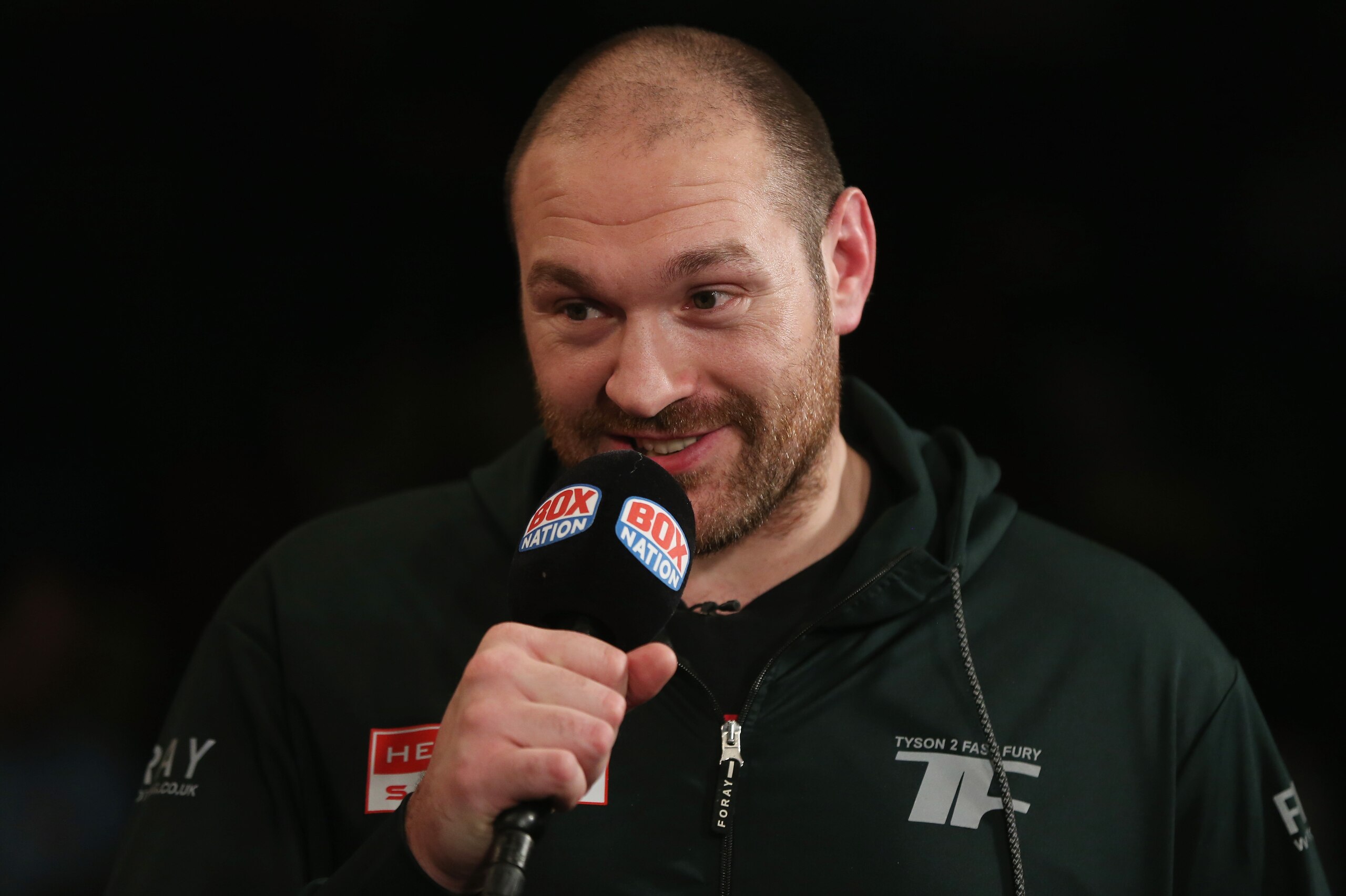 LONDON, ENGLAND - APRIL 30:  Heaveyweight Champion Tyson Fury is interviewed ahead of the vacant WBO Intercontinental Heavyweight Championship contest between Hughie Fury and Fred Kassi at Copper Box Arena on April 30, 2016 in London, England.  (Photo by Alex Morton/Getty Images)