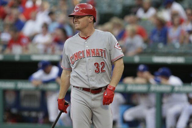 Cincinnati Reds Jay Bruce stand on the field during the first inning of a baseball game against the Texas Rangers in Arlington, Texas, Tuesday, June 21, 2016. (AP Photo/LM Otero)