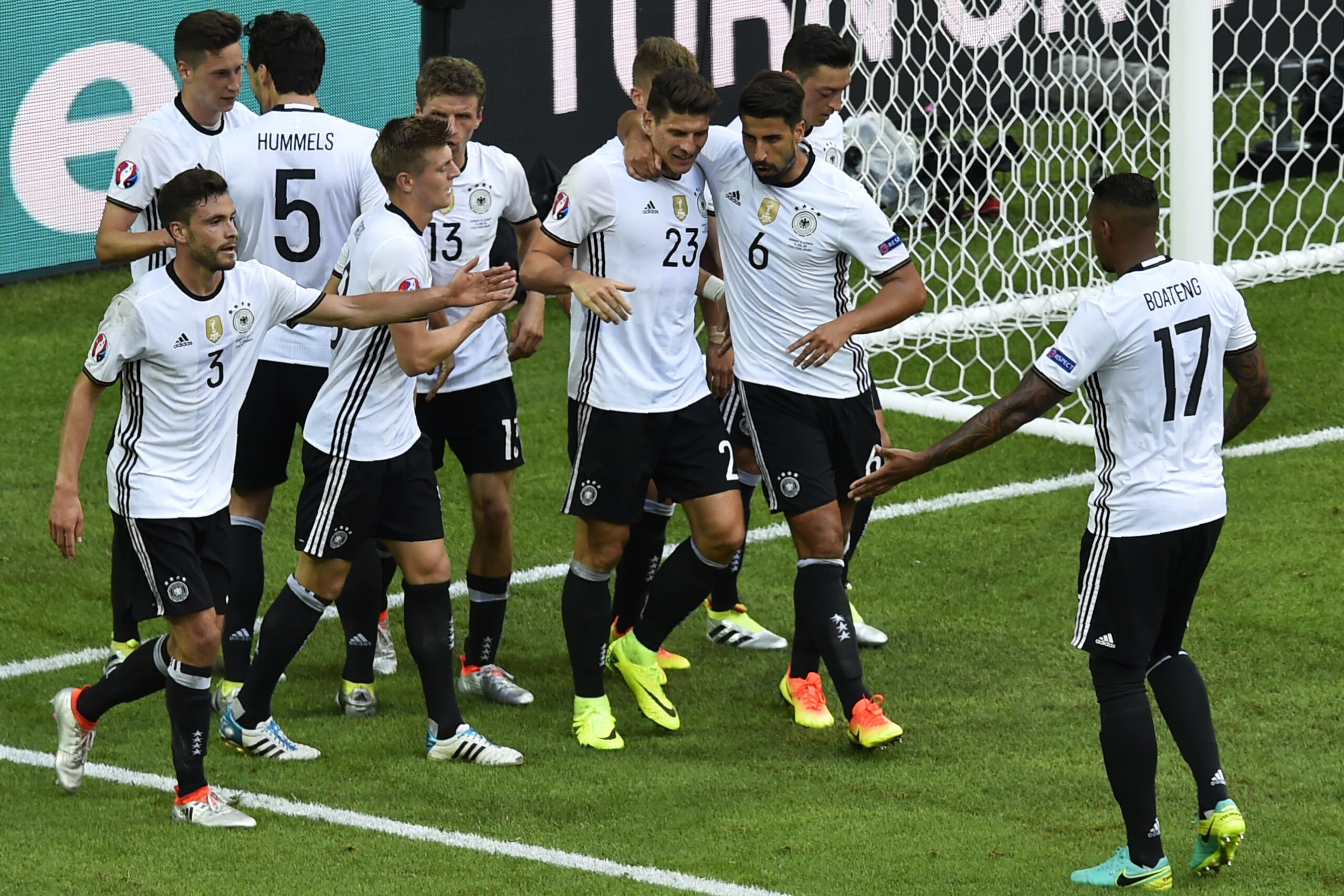 Germany's forward Mario Gomez (C) celebrates with teammates after scoring during the Euro 2016 round of 16 football match between Germany and Slovakia at the Pierre-Mauroy stadium in Villeneuve-d'Ascq, near Lille, on June 26, 2016.   / AFP / DENIS CHARLET        (Photo credit should read DENIS CHARLET/AFP/Getty Images)
