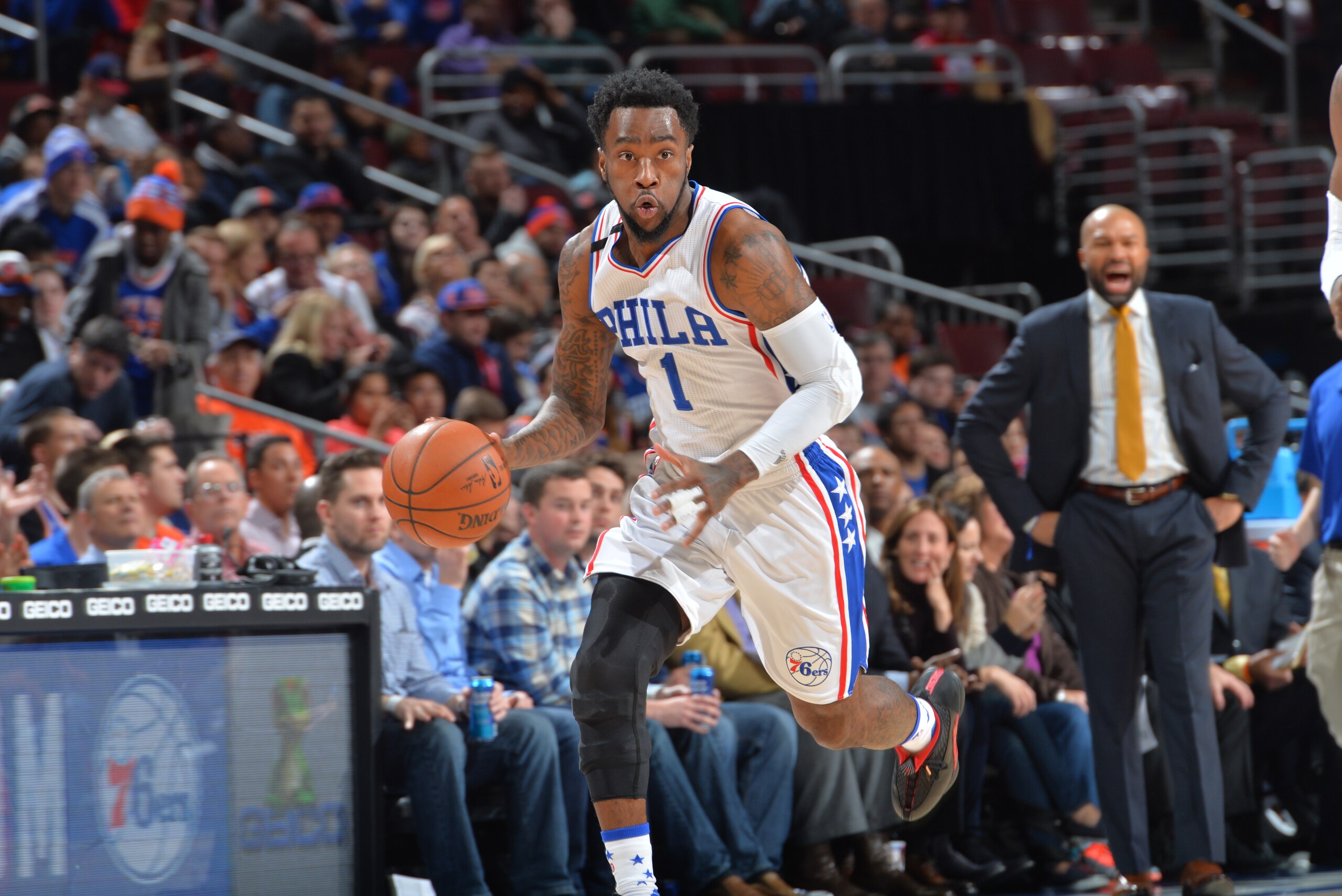 PHILADELPHIA,PA - DECEMBER 18: Tony Wroten #1 of the Philadelphia 76ers dribbles up court against the New York Knicks at Wells Fargo Center on December 18, 2015 in Philadelphia, Pennsylvania NOTE TO USER: User expressly acknowledges and agrees that, by downloading and/or using this Photograph, user is consenting to the terms and conditions of the Getty Images License Agreement. Mandatory Copyright Notice: Copyright 2015 NBAE (Photo by Jesse D. Garrabrant/NBAE via Getty Images)