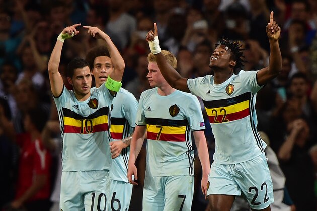 Belgium's forward Michy Batshuayi (R) celebrates with teammate after scoring his team's second goal  during the Euro 2016 round of 16 football match between Hungary and Belgium at the Stadium Municipal in Toulouse on June 26, 2016.   / AFP / Attila KISBENEDEK        (Photo credit should read ATTILA KISBENEDEK/AFP/Getty Images)