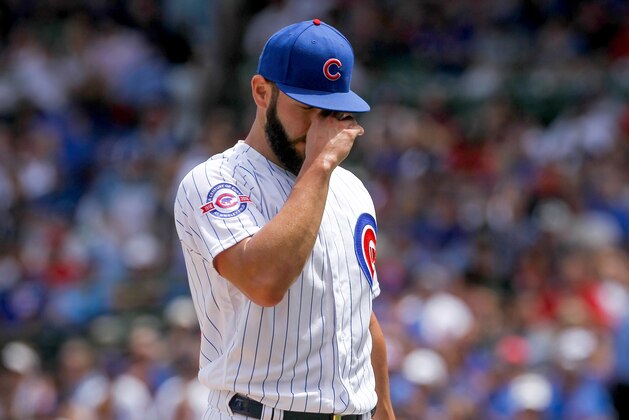 CHICAGO, IL - JUNE 22:  Jake Arrieta #49 of the Chicago Cubs walks off the mound between innings against the St. Louis Cardinals at Wrigley Field on June 22, 2016 in Chicago, Illinois. (Photo by Dylan Buell/Getty Images)