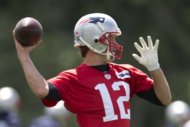 New England Patriots quarterback Tom Brady (12)  passes during an NFL football practice Monday, June 13, 2016, in Foxborough, Mass. (AP Photo/Michael Dwyer)
