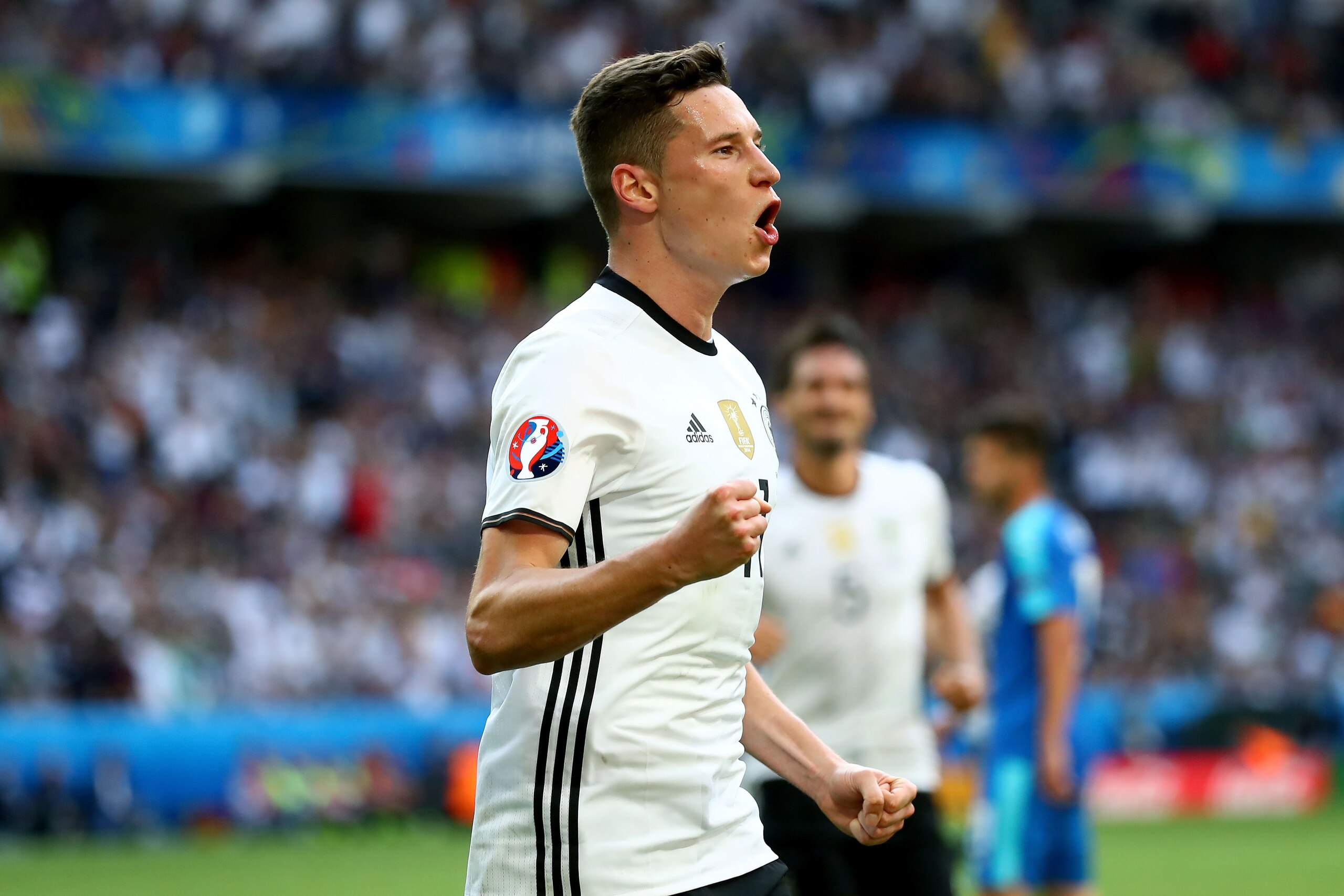LILLE, FRANCE - JUNE 26:  Julian Draxler of Germany celebrates scoring his team's third goal during the UEFA EURO 2016 round of 16 match between Germany and Slovakia at Stade Pierre-Mauroy on June 26, 2016 in Lille, France.  (Photo by Alexander Hassenstein/Getty Images)