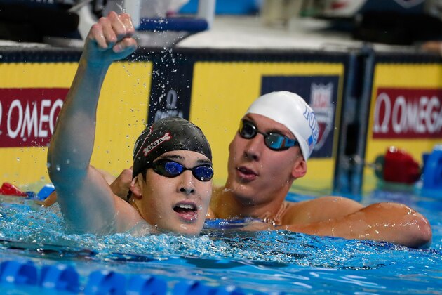 OMAHA, NE - JUNE 26:  Chase Kalisz of the United States celebrates with Jay Litherland of the United States after winning the final heat for the Men's 400 Meter Individual Medley during Day One of the 2016 U.S. Olympic Team Swimming Trials at CenturyLink Center on June 26, 2016 in Omaha, Nebraska.  (Photo by Al Bello/Getty Images)
