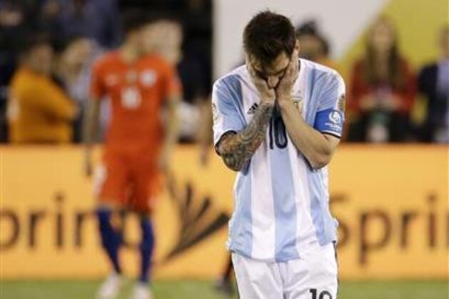 Argentina's Lionel Messi reacts after missing his shot during penalty kicks in the Copa America Centenario championship soccer match, Sunday, June 26, 2016, in East Rutherford, N.J. Chile defeated Argentina 4-2- in penalty kicks. (AP Photo/Julio Cortez)