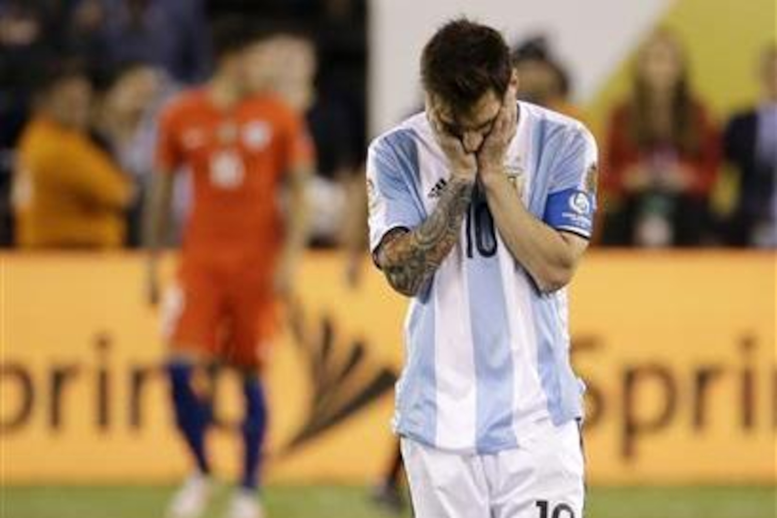 Argentina's Lionel Messi reacts after missing his shot during penalty kicks in the Copa America Centenario championship soccer match, Sunday, June 26, 2016, in East Rutherford, N.J. Chile defeated Argentina 4-2- in penalty kicks. (AP Photo/Julio Cortez)